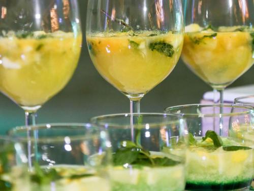 a row of wine glasses with food in them at Ibis Sfax in Sfax