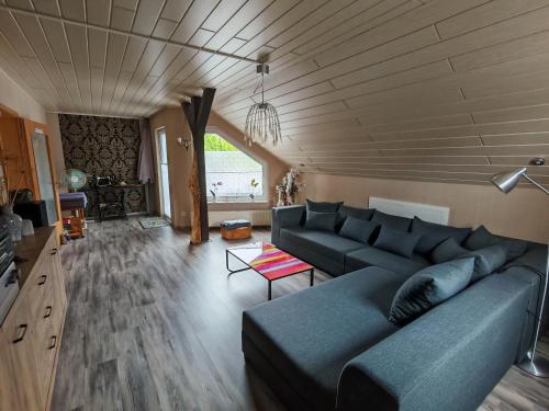 Ruang duduk di Ferienwohnung Schmidt Werratal