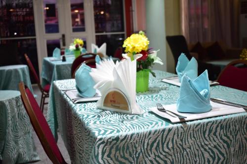 Ein Restaurant oder anderes Speiselokal in der Unterkunft Safyad Hotel 