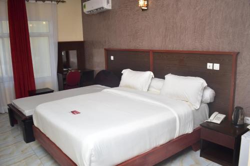 Ein Bett oder Betten in einem Zimmer der Unterkunft Safyad Hotel