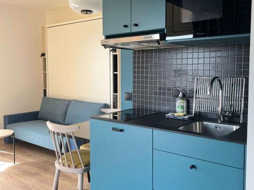 Küche/Küchenzeile in der Unterkunft Aparthotel Adagio Access Porte de Camargue