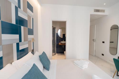 Postel nebo postele na pokoji v ubytování B&B Maiori Suites