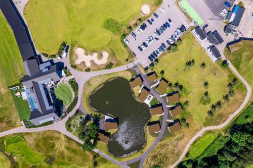 an aerial view of a park with a building at Halmstad Golfarena Hotell & Lägenheter in Halmstad