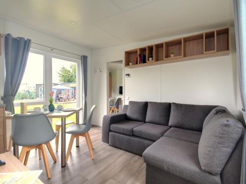 Posezení v ubytování Holiday Home Tiny Haus Sunny by Interhome