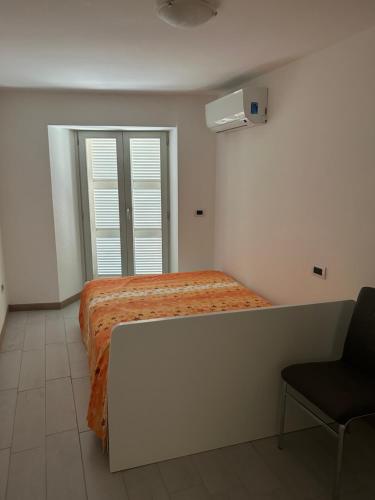 Postel nebo postele na pokoji v ubytování Casa Massinius