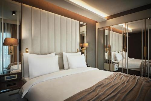Letto o letti in una camera di The Hotels, Galata