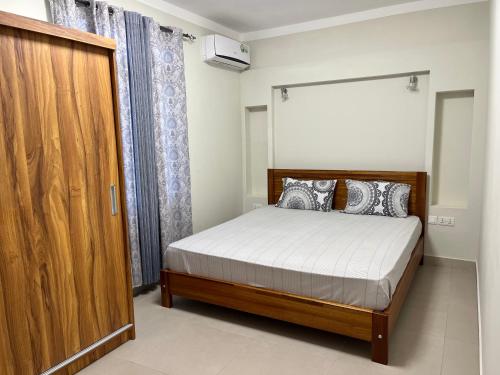 Voodi või voodid majutusasutuse Pearl Gate Residence Apt No 3 toas