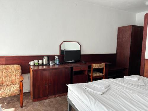 Postel nebo postele na pokoji v ubytování Pensjonat Jurata