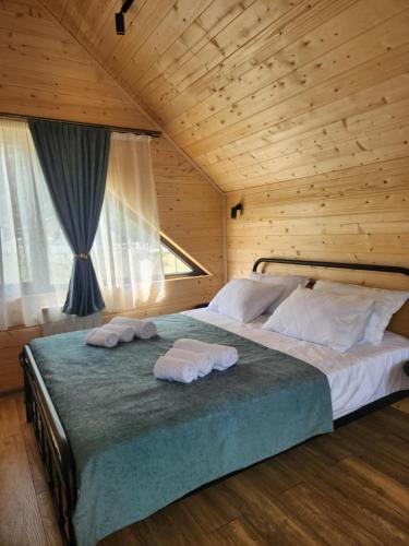 Postel nebo postele na pokoji v ubytování Cottage Liantto
