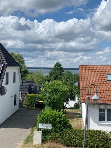 a view of the water from the roofs of houses at Casa Belvedere in Göhren-Lebbin
