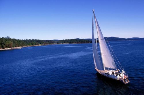 a sailboat on a large body of water at Casa Belvedere in Göhren-Lebbin