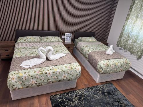 The Commongate Hotelsにあるベッド