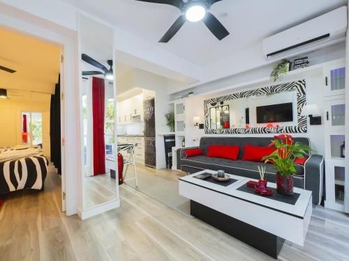 Televisyen dan/atau pusat hiburan di Cubo's Poseidon Apartment 2 & Pool