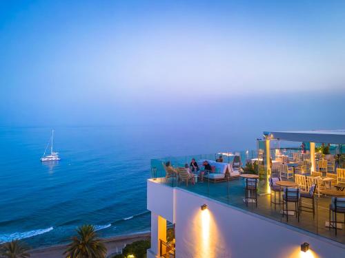 a view of the ocean from a hotel balcony at El Fuerte Marbella in Marbella