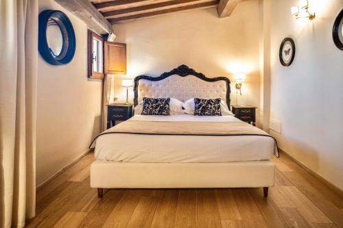 Ένα ή περισσότερα κρεβάτια σε δωμάτιο στο Residenza Il Colle