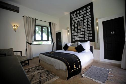 Cama o camas de una habitación en Domaine DAR JMEL & Dar Abi Samama
