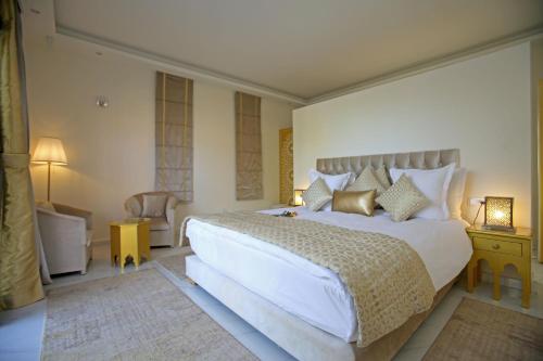 Cama o camas de una habitación en Domaine DAR JMEL & Dar Abi Samama