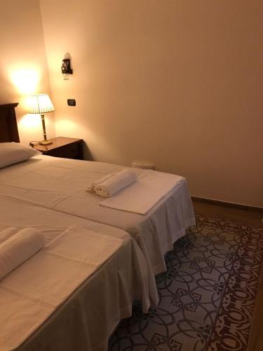 Postel nebo postele na pokoji v ubytování Casa Rosa