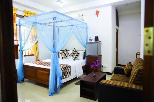Cama o camas de una habitación en Village Star Rest-Mirissa