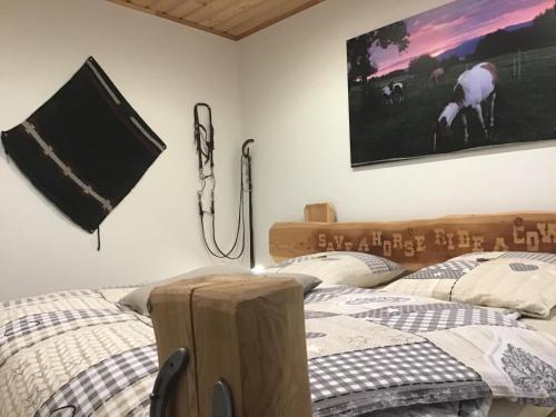 Ένα ή περισσότερα κρεβάτια σε δωμάτιο στο Wild Life Ranch