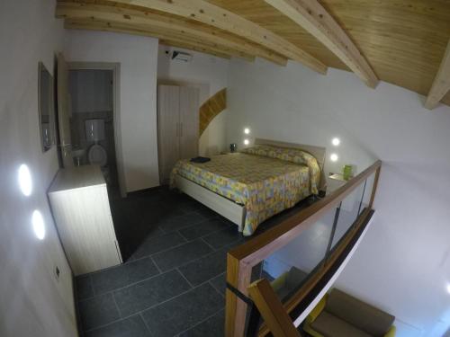 Postelja oz. postelje v sobi nastanitve Mini Loft