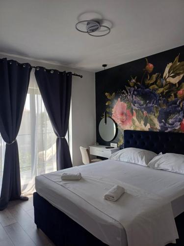 En eller flere senge i et værelse på Apartman Maris, self check in