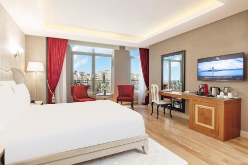 Télévision ou salle de divertissement dans l'établissement CVK Park Bosphorus Hotel Istanbul