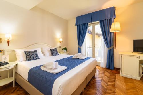 Hotel Galeazziにあるベッド
