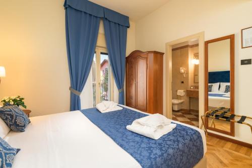 Hotel Galeazziにあるベッド