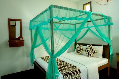 Cama o camas de una habitación en Village Star Rest-Mirissa
