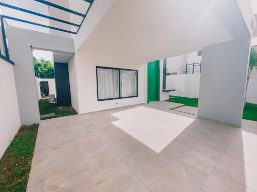 an empty room with white walls and a ceiling at Villa luxury Kerry Residence 02 in Punta Cana