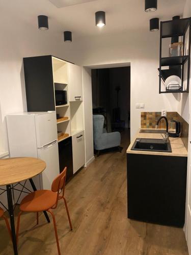 Kuchyň nebo kuchyňský kout v ubytování Apart Rembricz