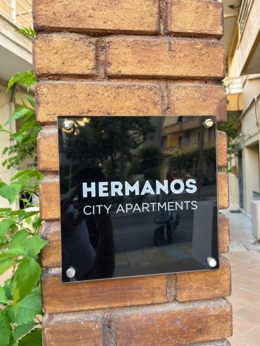 Сертификат, награда, вывеска или другой документ, выставленный в Hermanos City Apartment's