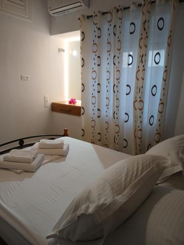 Ένα ή περισσότερα κρεβάτια σε δωμάτιο στο Panorama Apartment