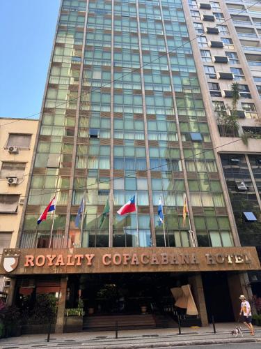 a building with flags in front of it at Royalty Copacabana Hotel in Rio de Janeiro