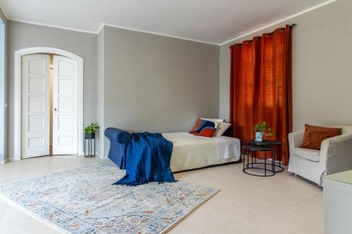 Postel nebo postele na pokoji v ubytování Casa Andre