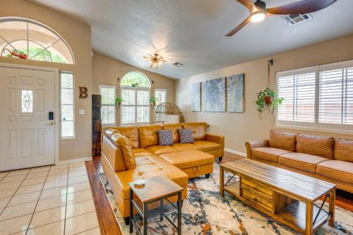 a living room with a couch and a table at Spacious Mesquite Home about 3 Mi to Golf Courses! in Mesquite