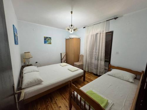 Postel nebo postele na pokoji v ubytování Igalo Apartman Despich