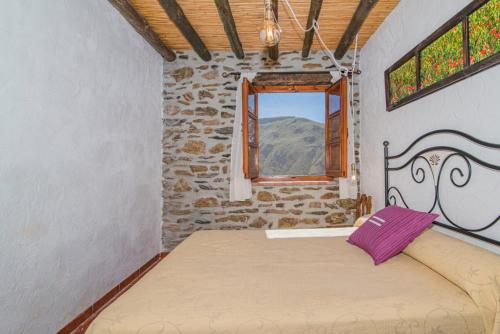 Ένα ή περισσότερα κρεβάτια σε δωμάτιο στο Casa Amat