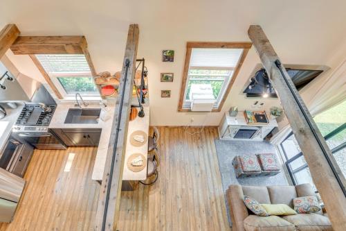 an overhead view of a tiny house with wooden floors at Historic Charm and Modern Luxury 6 Mi to Stowe Mtn in Stowe