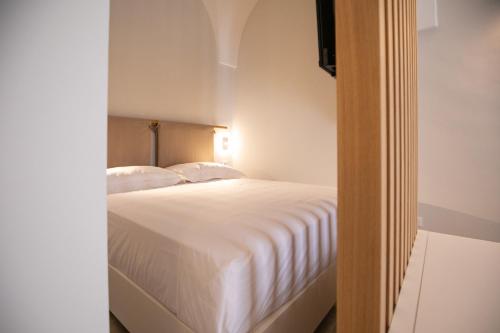 Ένα ή περισσότερα κρεβάτια σε δωμάτιο στο Casa Ciccio