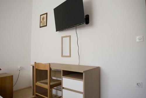TV a/nebo společenská místnost v ubytování Seaside Apartments