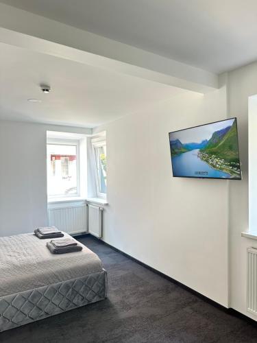 Ένα ή περισσότερα κρεβάτια σε δωμάτιο στο SILVIA apartment 101