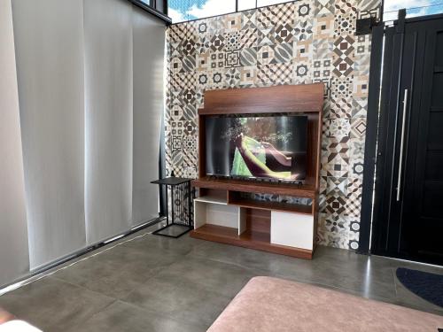 TV a/nebo společenská místnost v ubytování Belvedere Suite Campestre