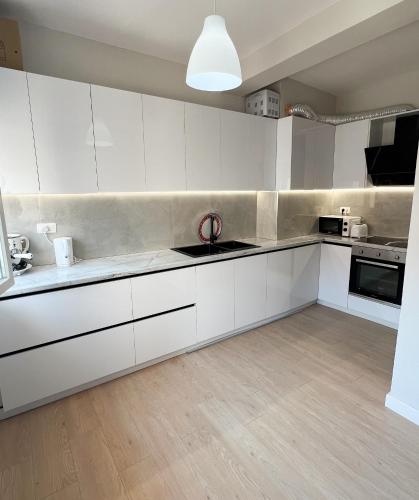 Una cocina o zona de cocina en Sea View Apartaments