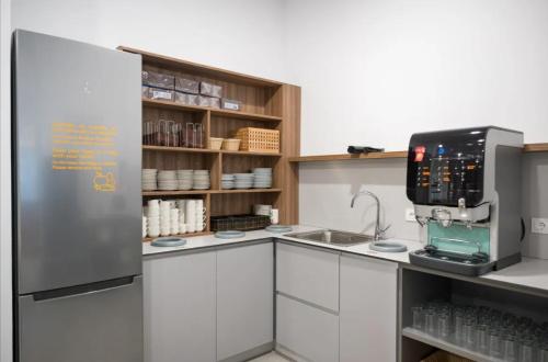 Kuchyň nebo kuchyňský kout v ubytování PALACIO REAL HOSTEL