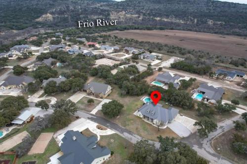 an aerial view of a village with a red spot on a house at Driftwood in Concan
