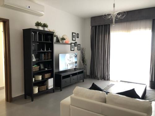 Billede fra billedgalleriet på Sea and Pool View penthouse Families only i El-Alamein