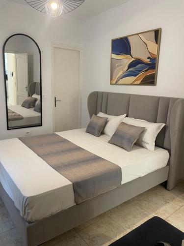 Postel nebo postele na pokoji v ubytování Sérenity Home