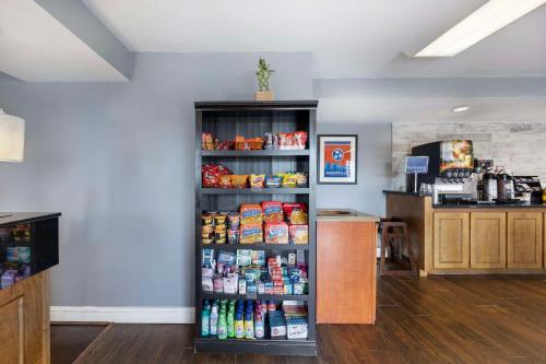 a store with a shelf filled with food at Best Western Dickson in Dickson